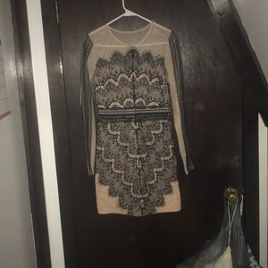 Nude and black lace mini dress